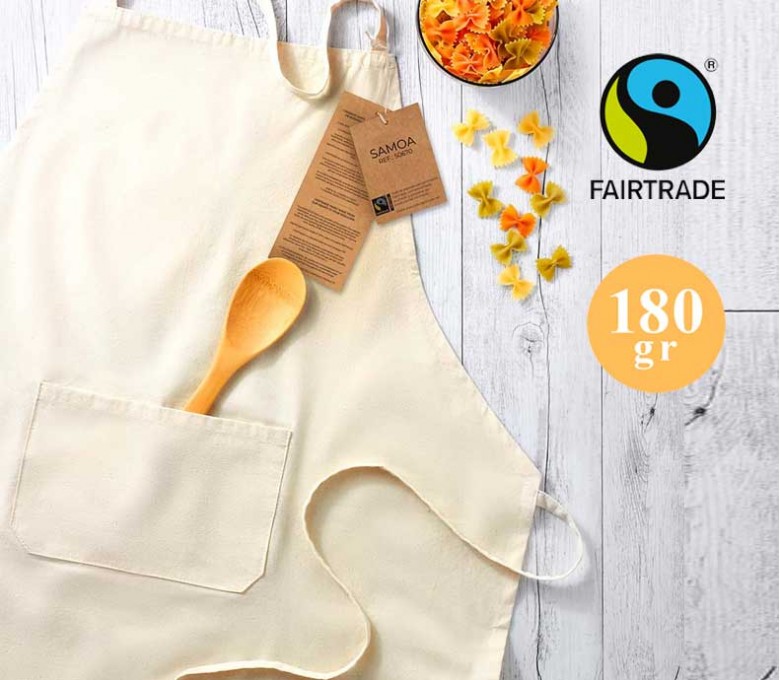 delantal para personalizar con logo en algodon Fairtrade en color natural en mesa de cocina